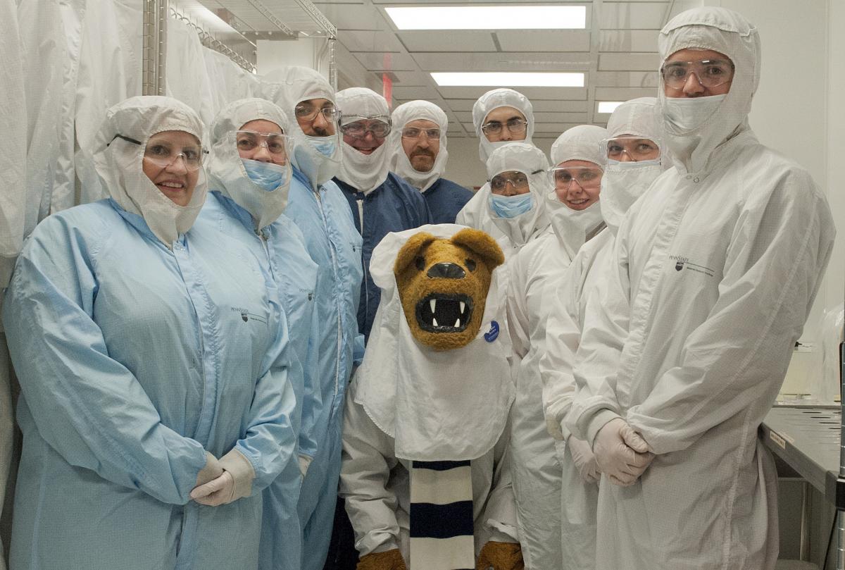 Lab personnel in cleanroom PPE