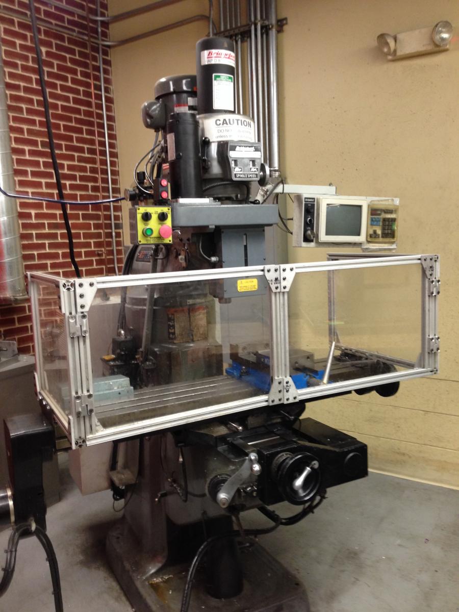 Drill press with machine guarding